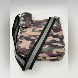 Ahdorned Camouflage Crossbody Bag with Gold Accents.
